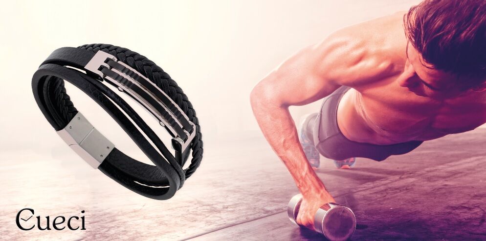 900x600 Man doing push-up exercise with dumbbell.jpg